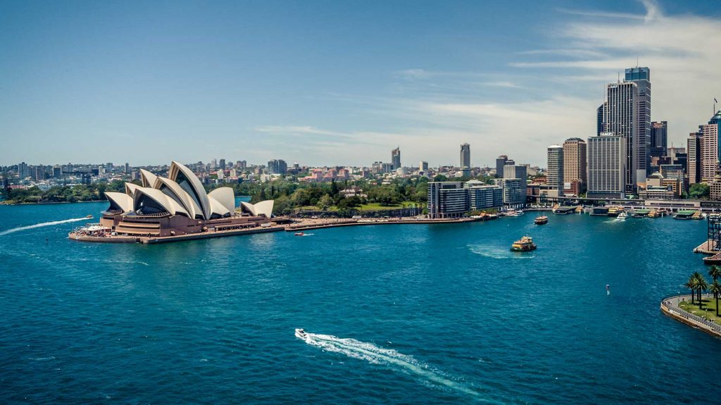 Visão aérea da Austrália destacando a Opera House de Sydney | Estudo e trabalho no exterior